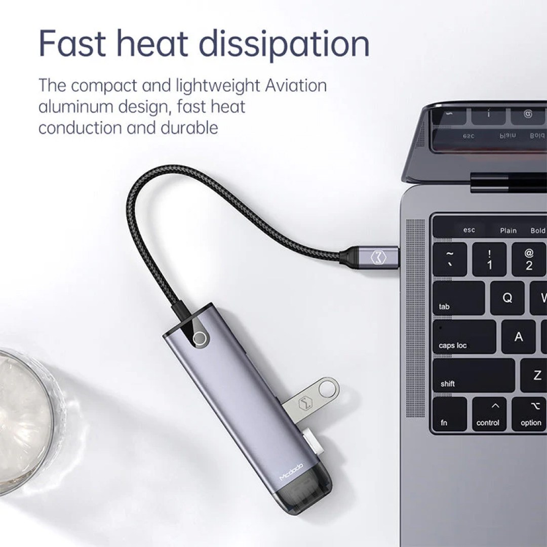 عکس هاب 6 پورت تایپ سی 100 وات مک دودو مدل Mcdodo HU-774 هاب 6in1 USB-C مک دودو مدل HU-774